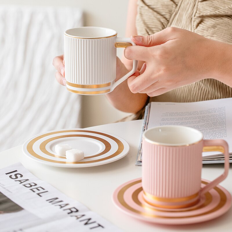 Elegant Sip: Ceramic Coffee Mug with Gold-Tinted Saucer