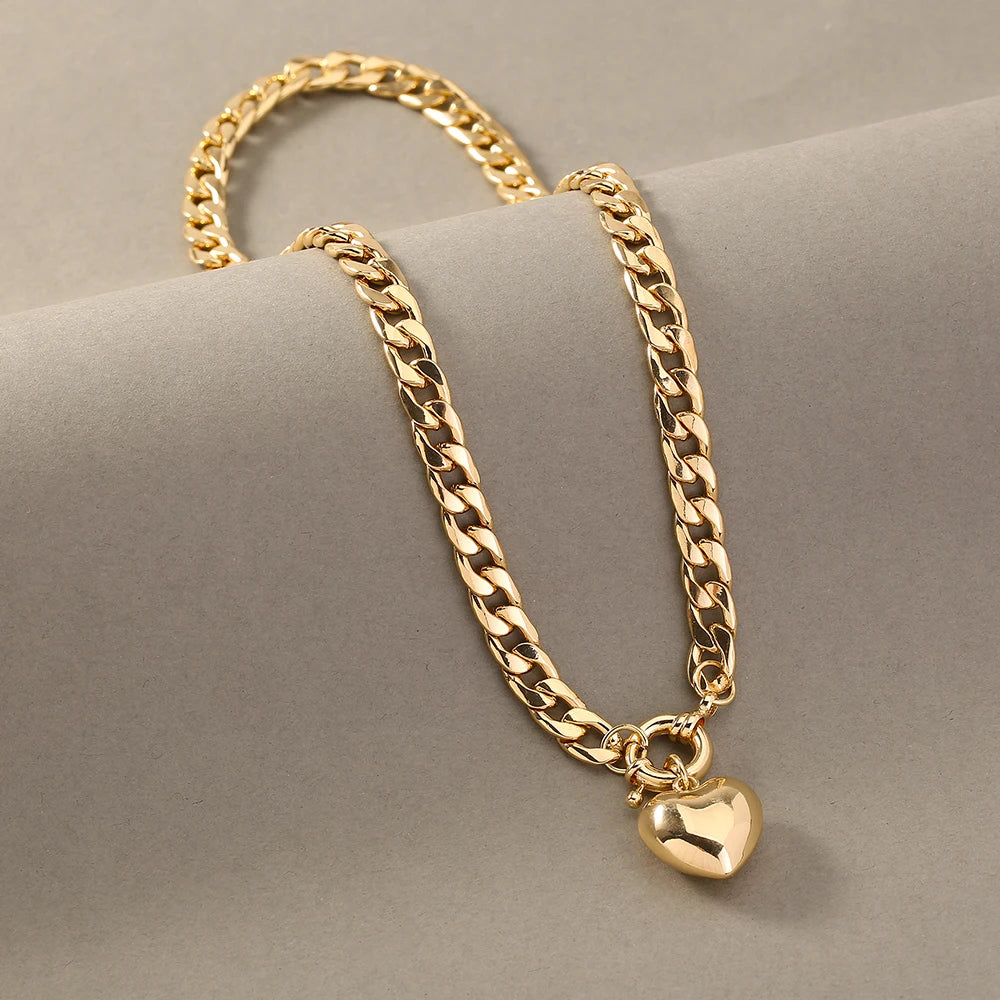 Power and Grace: Contrasting Link Necklace with Heart Charm