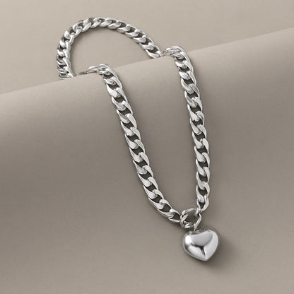 Power and Grace: Contrasting Link Necklace with Heart Charm